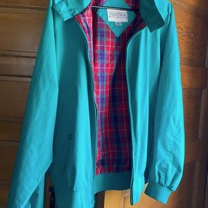 Green fishing jacket.
